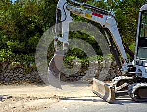 Mini excavator dig a trench