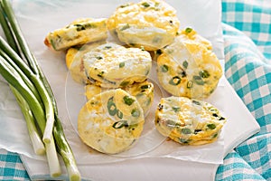 Mini frittatas with peas, green onion and feta