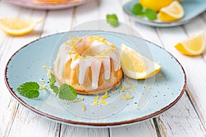 Mini lemon bundt cakes topped with lemon glaze