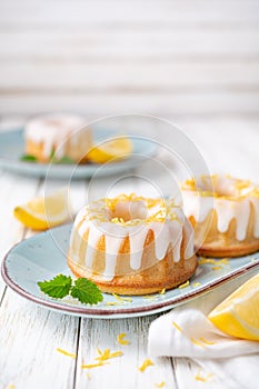 Mini lemon bundt cakes topped with lemon glaze