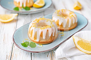 Mini lemon bundt cakes topped with lemon glaze