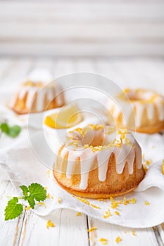 Mini lemon bundt cakes topped with lemon glaze