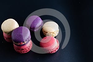 mini macaron different colour in a dark background