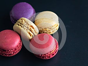 mini macaron different colour in a dark background