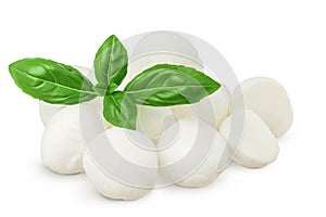 Mini mozzarella balls with basil leaf isolated on white background with full depth of field.