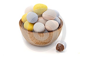 Mini Multicolored Candy Coated Chocolate Easter Eggs Isolated on a White Background