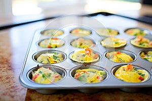 mini omelettes in muffin tin, out of the oven