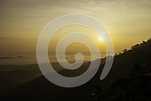 sunrise silhouette in Mini Ooty Malappuram, Kerala photo
