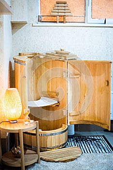 Mini phyto sauna - Cedar barrel. spa treatments. wooden bath. good for your health. health concept, take care of your body