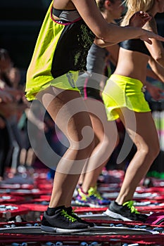 Mini Rebounder Workout: Girls doing Fitness Exercise in Outdoor Class at Gym