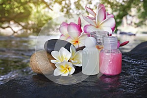 Mini set of bubble bath shower gel liquid with flowers and pebbl