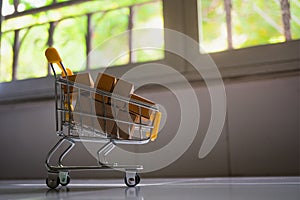 Mini shopping cart contain paper box using as e-commerce, online