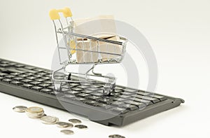 Mini shopping trolley isolated against white