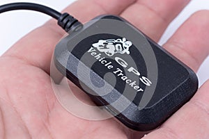 Mini spy gps tracker alarm device in the hand