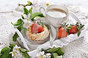 Mini tartlet with cottage cheese and strawberry and cappuccino photo