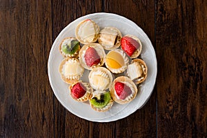 Mini Tarts, Tartolet or Tartlets with cream and fresh fruit