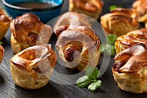 Mini Toad in the hole, Baked sausages in Yorkshire pudding with gravy