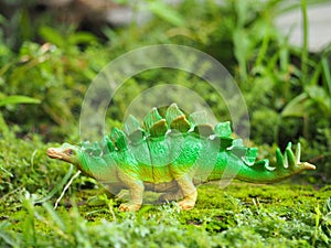 Mini toy of dinosaurs (stegosaurs / stegosaurus). Prehistoric animal concept design.