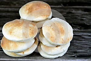 Mini traditional Shami flat bread with wheat and flour, small Aish Shamy or small pita bread baked in extremely hot ovens, it is