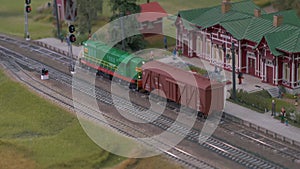 Mini Train Station Modelling. Model of Railway Station With Moving Train. Toy Train Models on Railroad Set Mockup