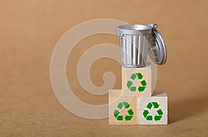 Mini Trash Can on Recycling Blocks ' Concept of Eco-Friendly Waste Management