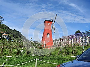 A mini windmill was built for toursim purpose. Situated at Happy Garden resort, Kundasang, Sabah, Malaysia.