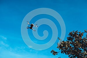 a mini2 drone flying in the sky