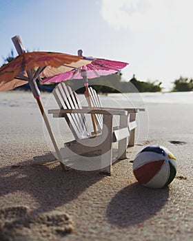 Miniature Adirondack chairs, umbrellas and a beach ball.