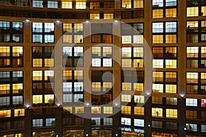 Miniature apartment building house at night