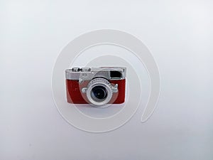 Miniature camera isolated on a white background