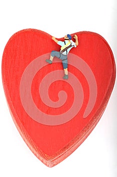 Miniature of climber scaling a red heart