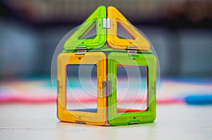 Miniature colorful plastic toy house. Colorful house.