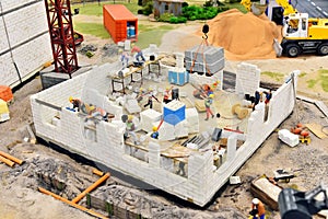 Miniature of construction site workers aerial view