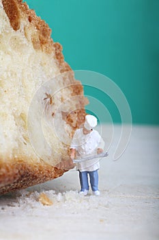 Miniature of cook with bread