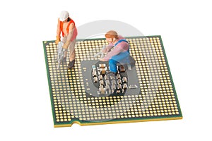 Miniature engineers or technician workers repairing CPU isolated on white. Computer service and technology concept.