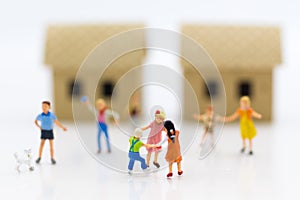 Miniature family: Childrens playing together. Image use for background International day of families concept