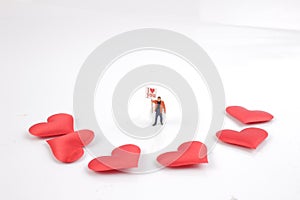 Miniature figner with board text