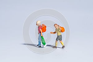 Miniature figure concept of childrens going to school