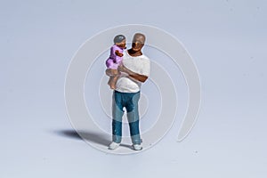 Miniature figure concept of father and child