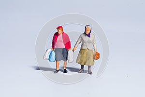 Miniature figure concept of female shopping