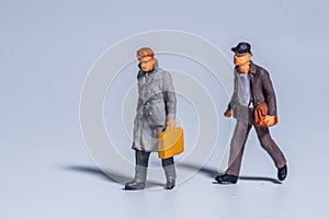 Miniature figure concept of people walking and traveling