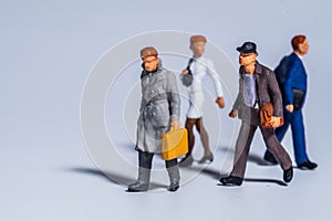 Miniature figure concept of people walking and traveling