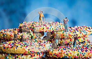 Miniature Figures Golfing on Sprinkle Cookies