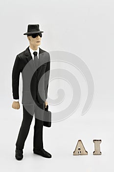 miniature figurine of a businessman with A.I. letters