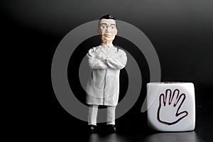 Miniature image of a doctor specializing in hand care photo