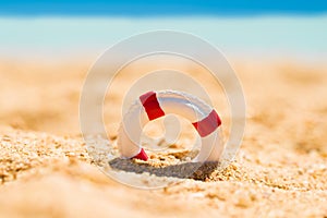 Miniature Lifebuoy In Sand