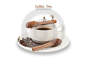 Miniature man work on coffee cup with Sugar Stick Cinnamon