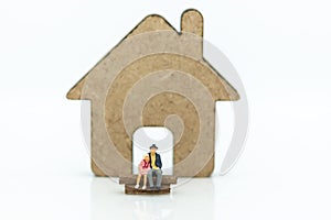Miniature people : Business on financial transactions for home loan. Image use for invesment, business concept