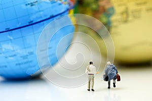 Miniature people : Businessman with mini world map,Business travel concept.