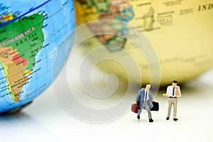 Miniature people : Businessman with mini world map,Business travel concept.